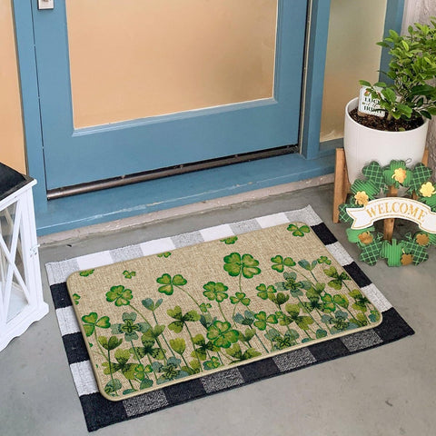 Artoid Mode doormat on porch showcases a festive motif for spring.