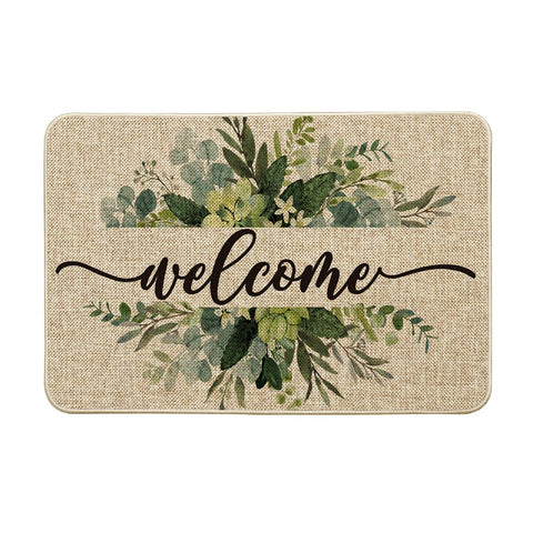 Artoid Mode eucalyptus floral leaves doormat greets guests at entryways.
