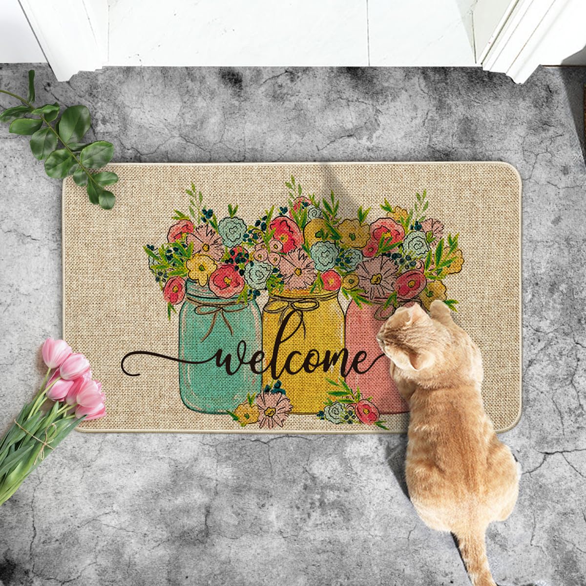 Artoid Mode Hello Spring Doormat placed on a porch for indoor-outdoor use