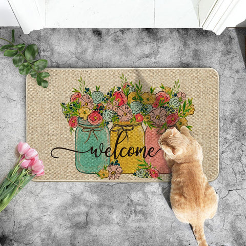 Artoid Mode Hello Spring Doormat placed on a porch for indoor-outdoor use