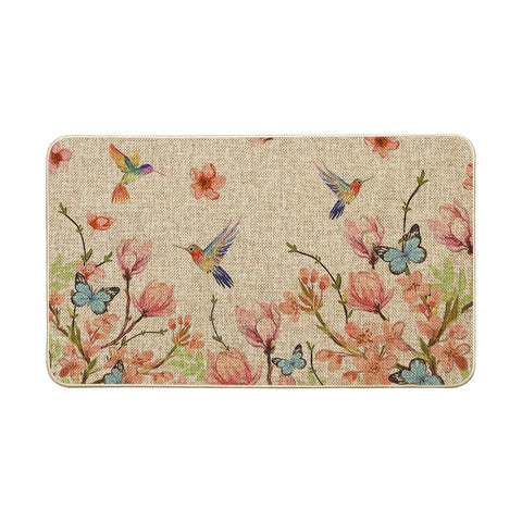 Artoid Mode hummingbird-butterflies-doormat enhances curb appeal with seasonal motif