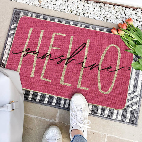 Artoid Mode Pink Hello Sunshine doormat closeup pattern highlights vibrant design