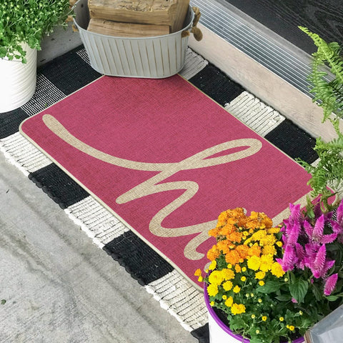Artoid Mode pink hi spring doormat close up shows seasonal pattern and texture.
