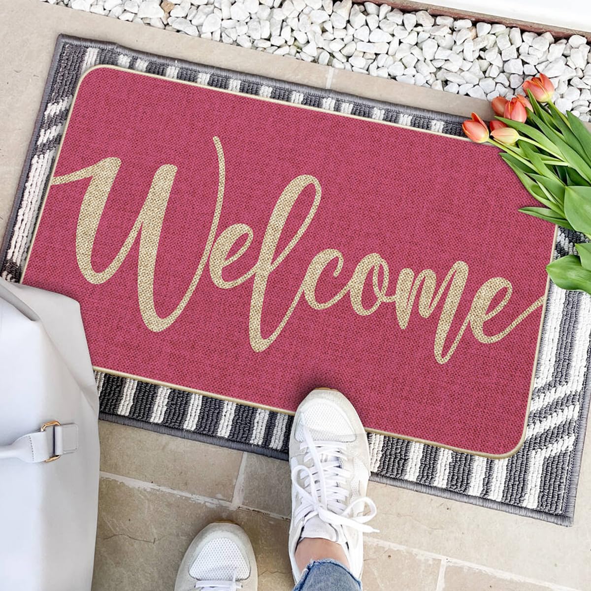 Artoid Mode Pink Welcome Spring Doormat placed outdoors highlighting low-profile design