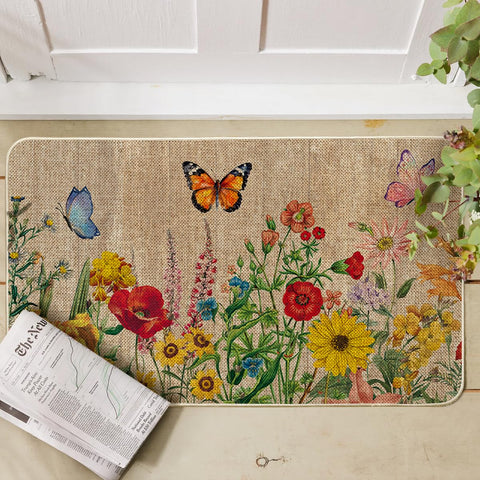 Artoid Mode doormat showcases a botanical motif with a low-profile, slip-resistant rubber backing.