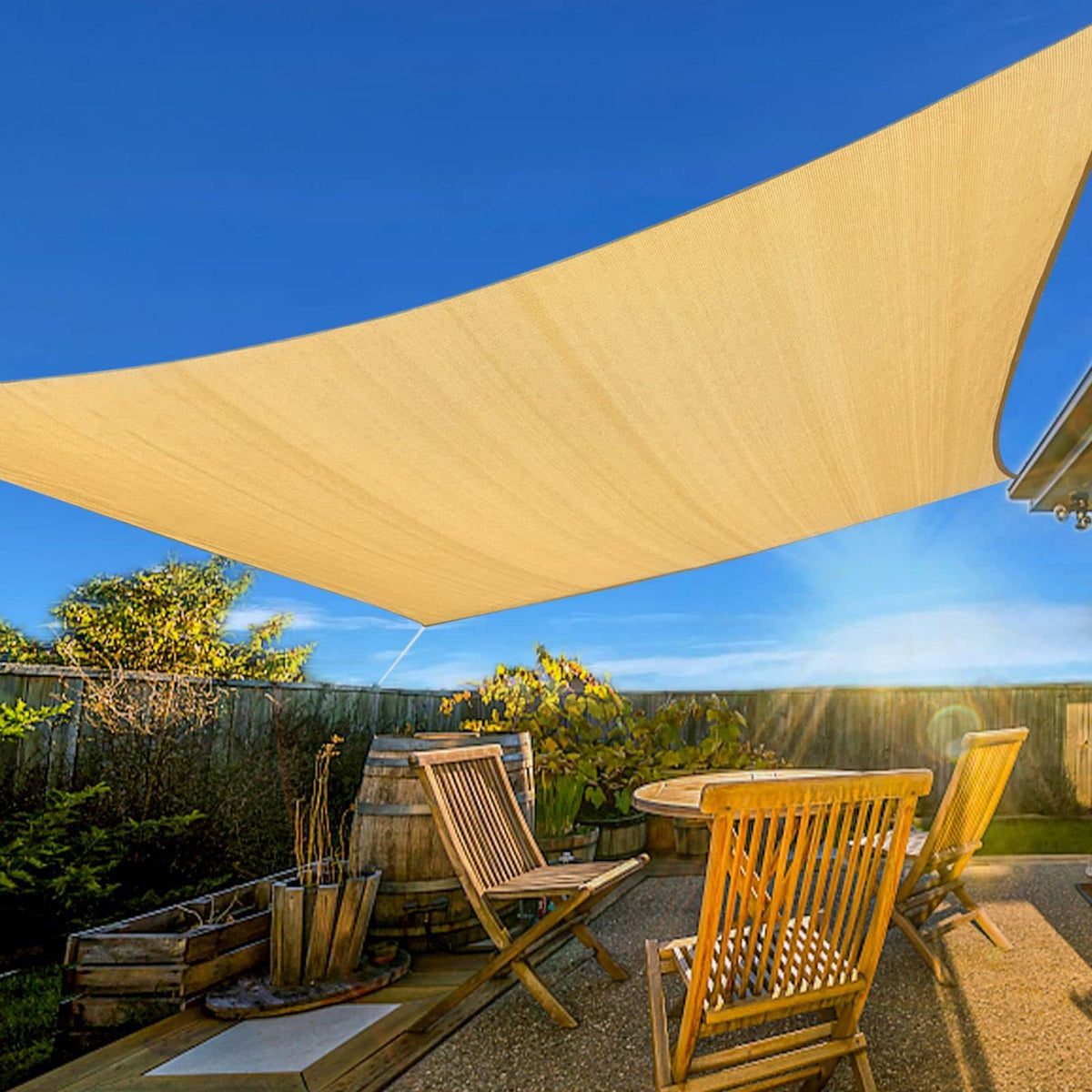 Artpuch Sun Shade Sail 12x16 sand, front view over a shaded patio