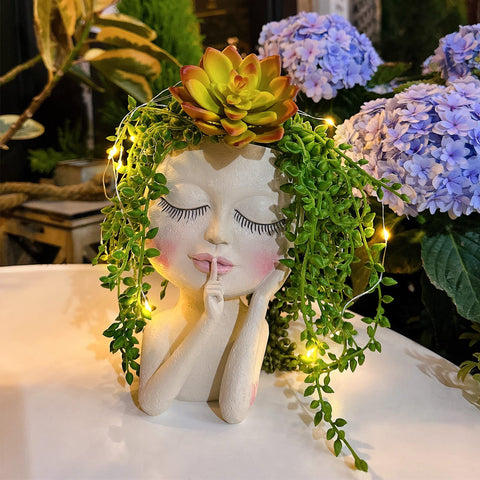 ASDFG Solar Face Pot with unique head design for stylish indoor or outdoor decor.