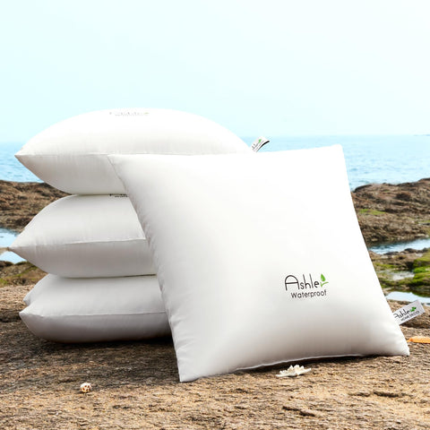 Ashler Home Deco outdoor pillow on a patio setting enhances garden decor.