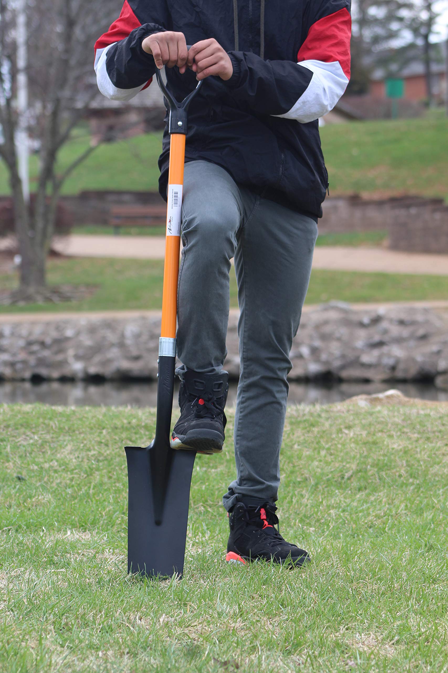 AshmanOnline drain spade with bright orange handle for high visibility outdoors.
