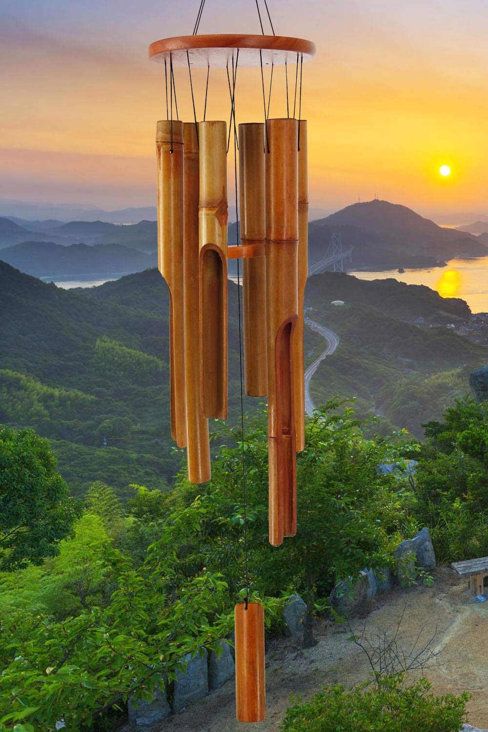 ASTARIN bamboo wind chimes outdoor 38in in garden scene, soothing natural tones.