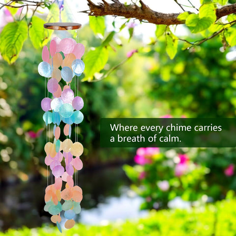 ASTARIN capiz-shell wind chime hanging by porch creates soothing breezes outdoors.