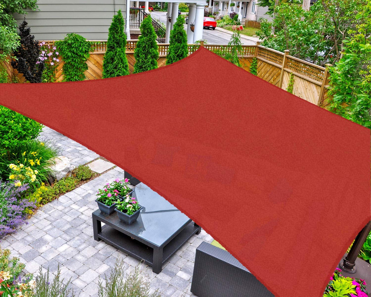 AsterOutdoor shade sail Terra 10x13 covers a patio.