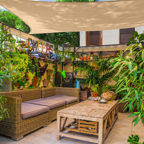 AsterOutdoor shade sail in Sand color complements outdoor décor while providing cooling shade.