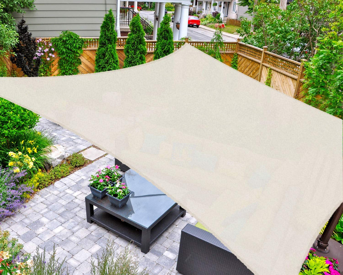 AsterOutdoor sun shade sail rectangle 16x20 in cream provides cool shade for patios.