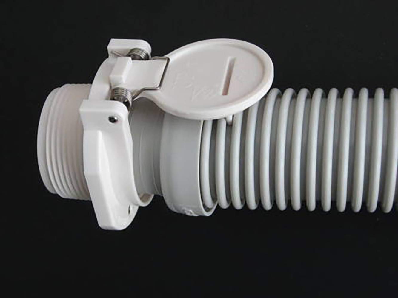 ATIE white wall fitting installed on pool wall for tidy integration.