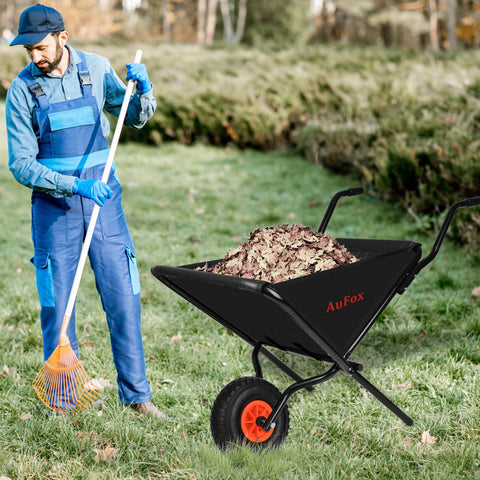 AuFox garden cart transporting soil, leaves, and mulch in the yard