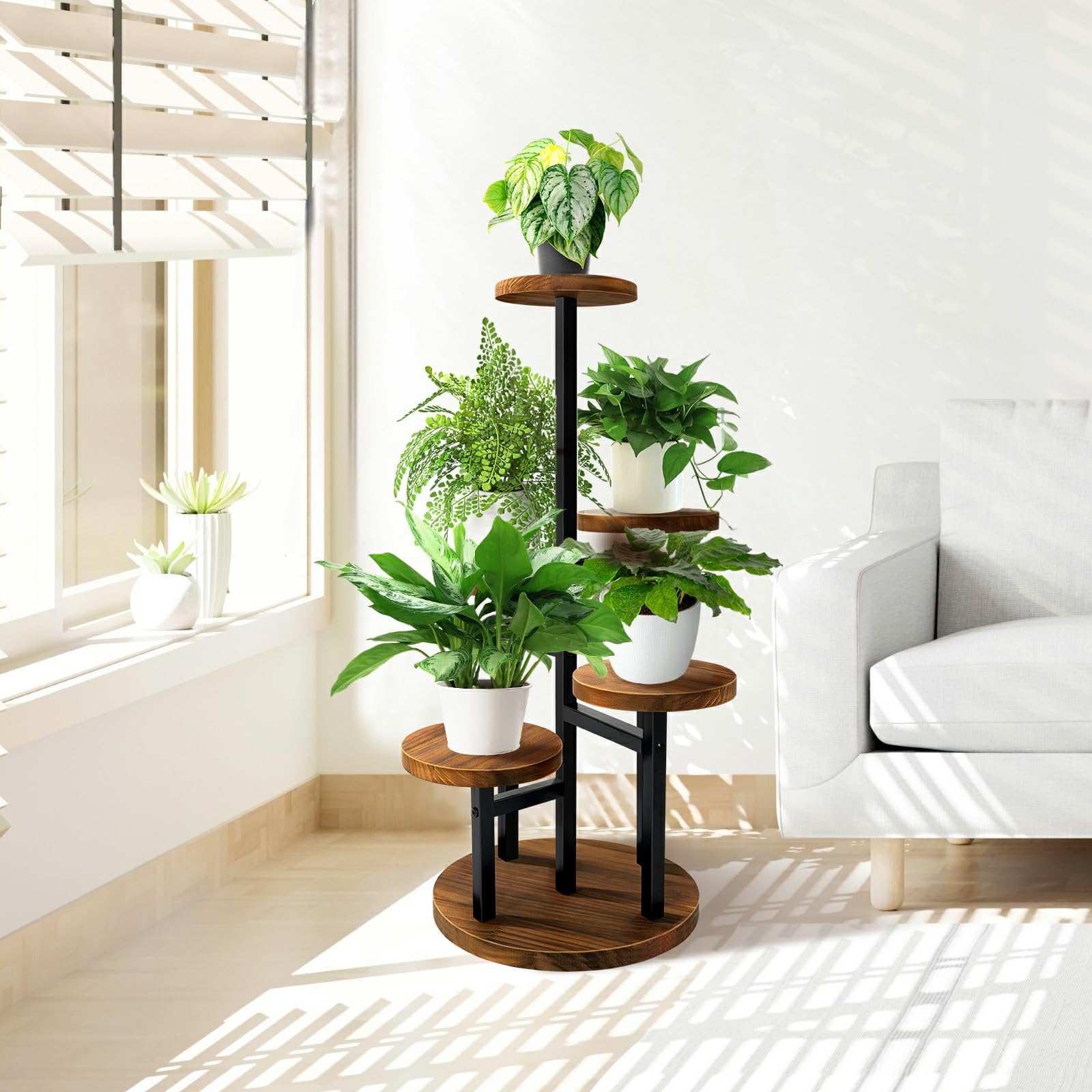 AUGOSTA plant stand on a balcony showcasing outdoor-friendly arrangement.