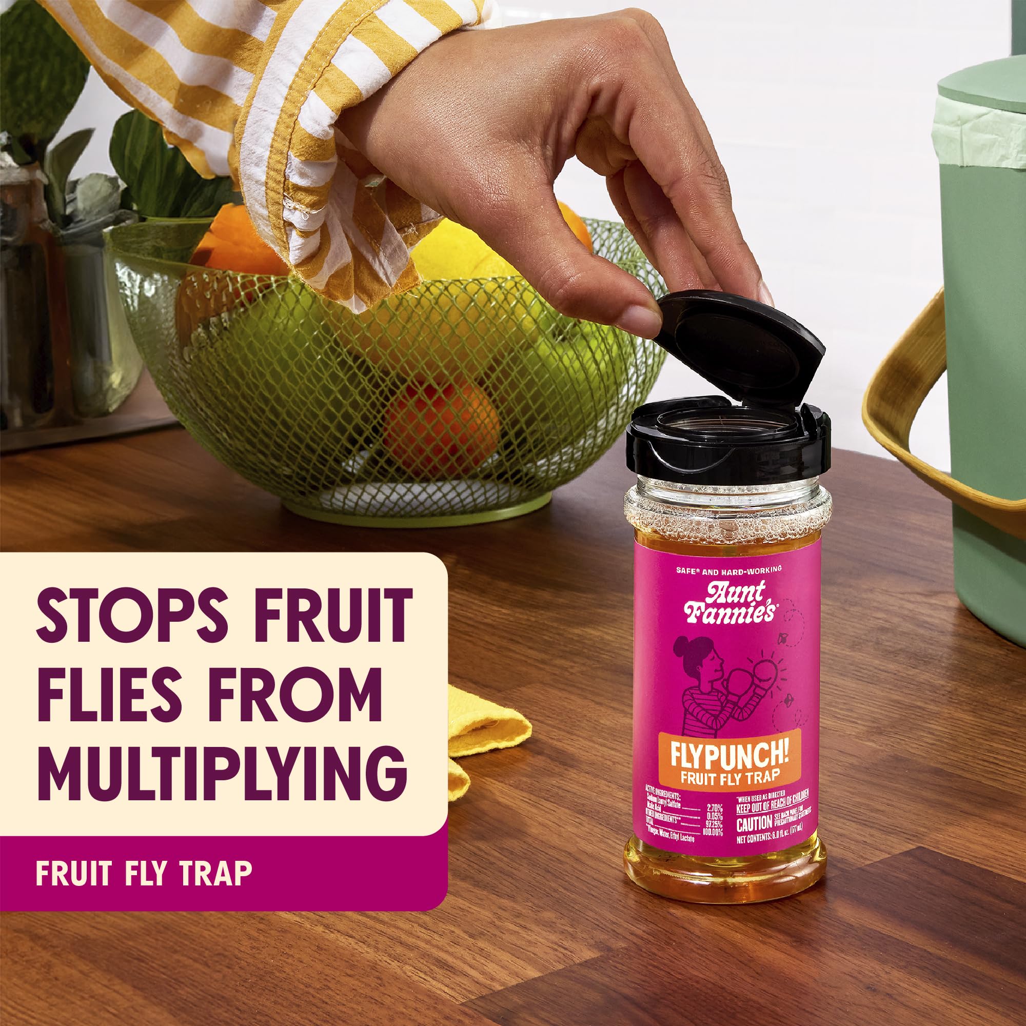 Aunt Fannie's FlyPunch trap in use with the flip-top lid open