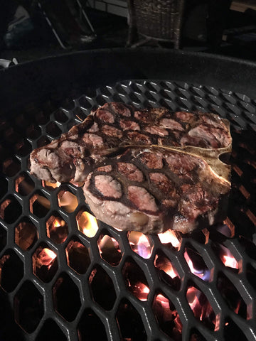 Aura 21.5-inch actual size grate for versatile backyard grilling setups.