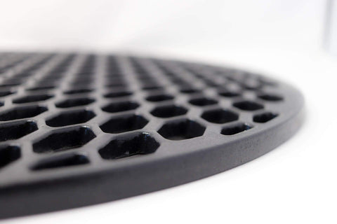 Aura cast iron grill grate with easy-clean surface for quick cleanup after grilling.