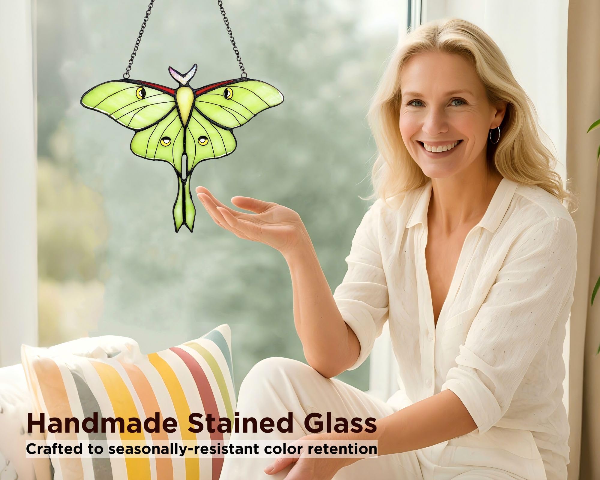 AuroAura Moon Moth suncatcher as a decorative window or wall piece.