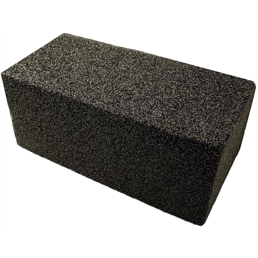 Avant Grub heavy-duty grill cleaning brick in action removing burnt-on residue safely