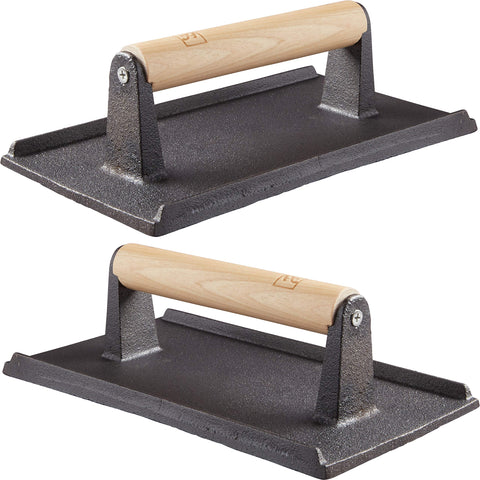 Avant Grub Pro Grade cast-iron grill press on grill for even sear