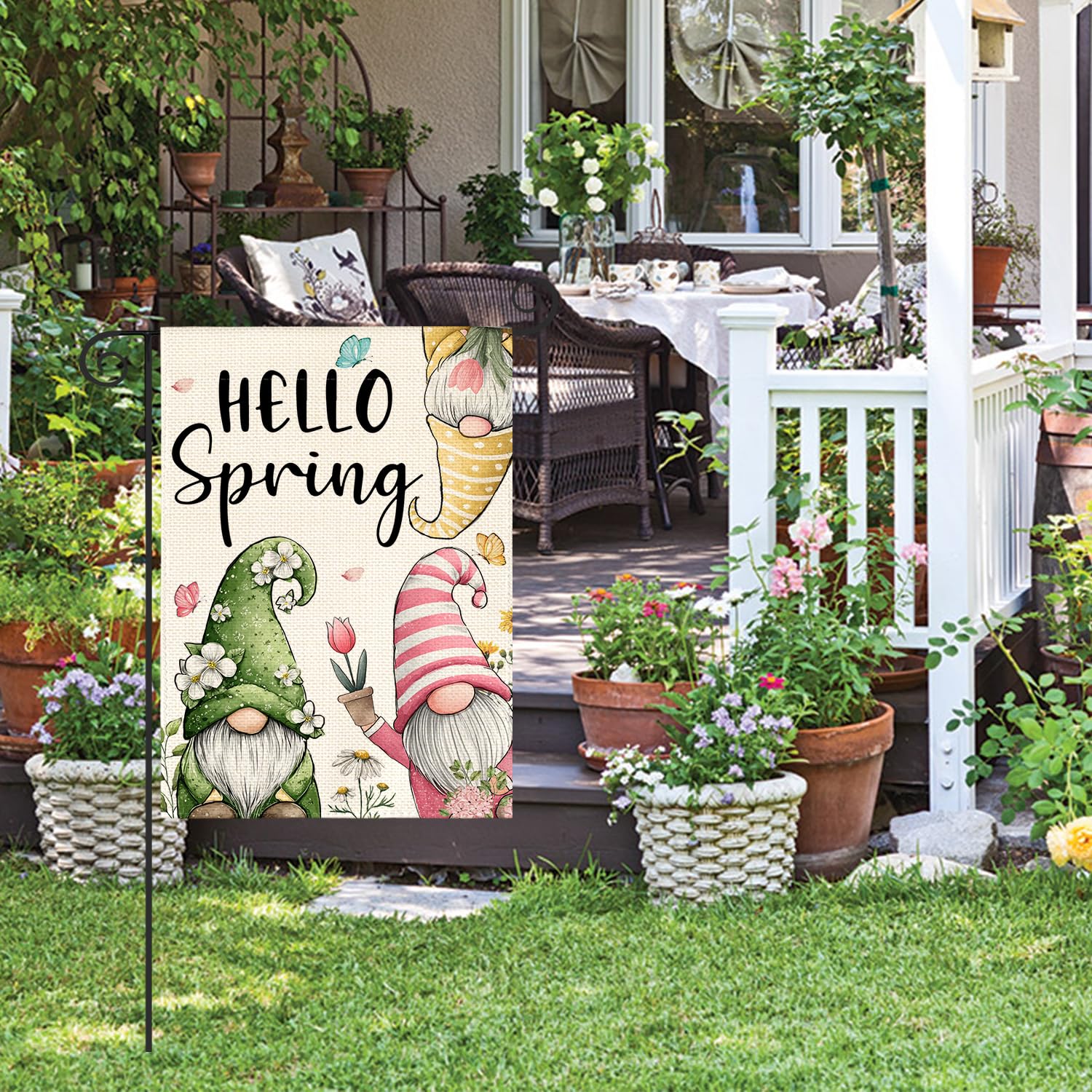 AVOIN colorlife Hello Spring Garden Flag features floral gnomes for seasonal whimsy on porch.