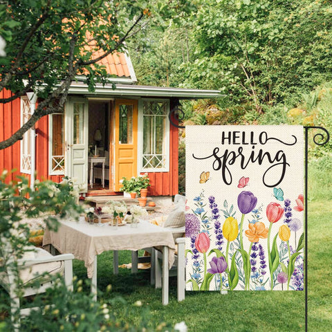 AVOIN colorlife Hello Spring garden flag displayed on a deck for seasonal yard decor.
