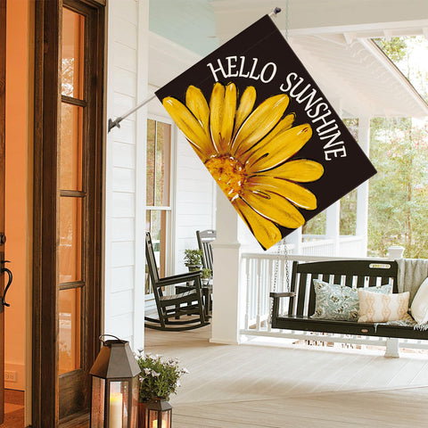 Flag mounted on a standard pole showing porch and yard usage