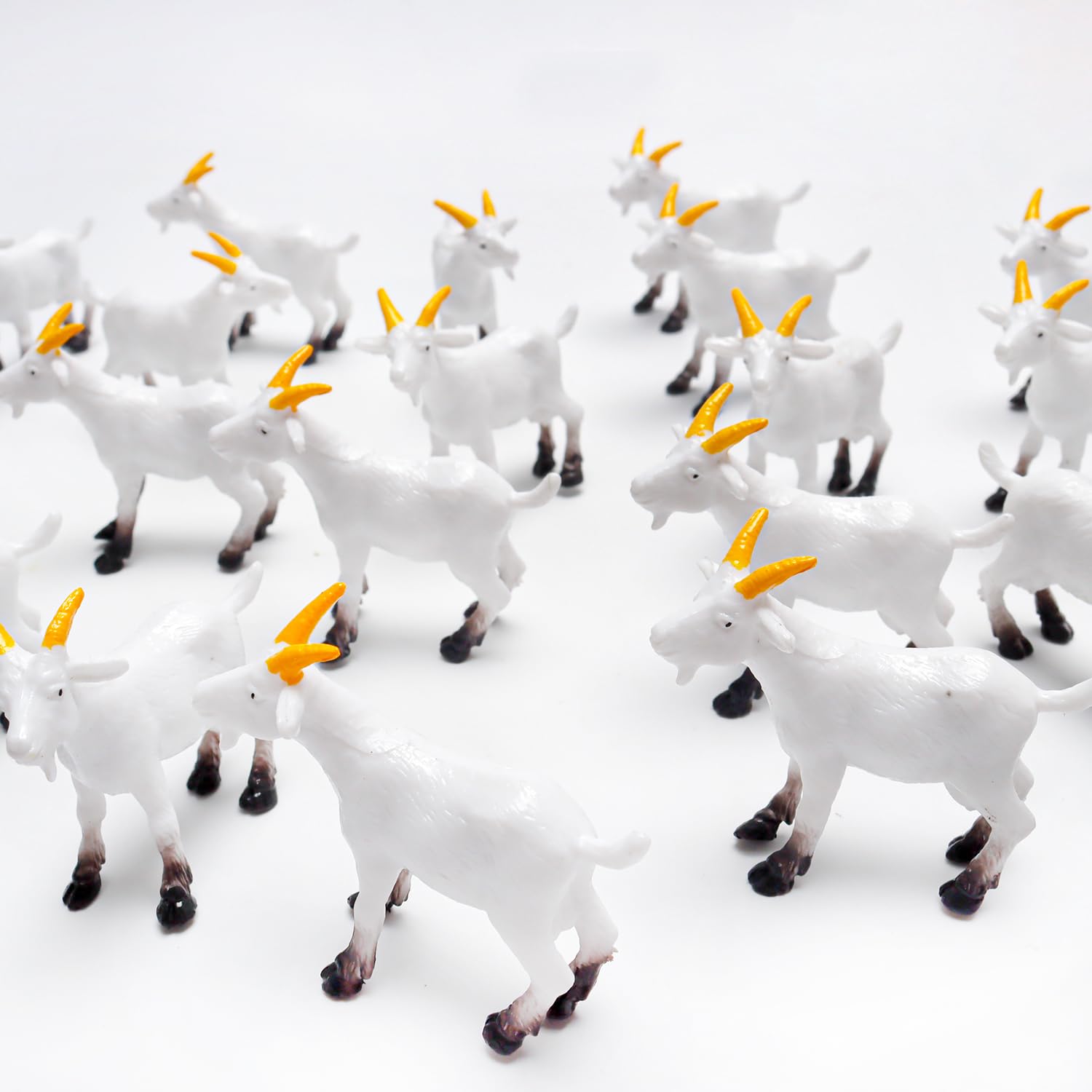 Aydinids goat figurines in a terrarium setup for a playful scene
