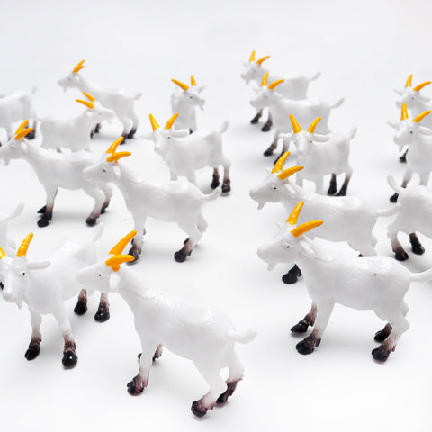 Aydinids goat figurines in a terrarium setup for a playful scene