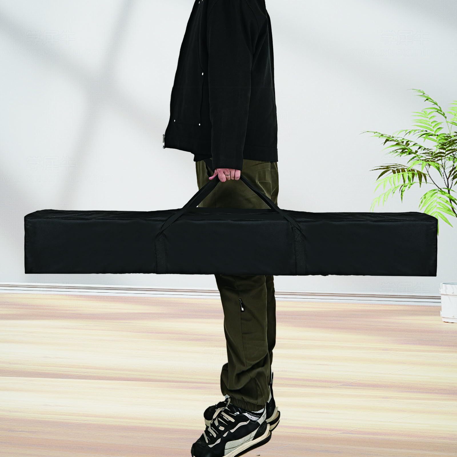 AYIXITIELU carrying strap demonstrates easy transport of the bag.