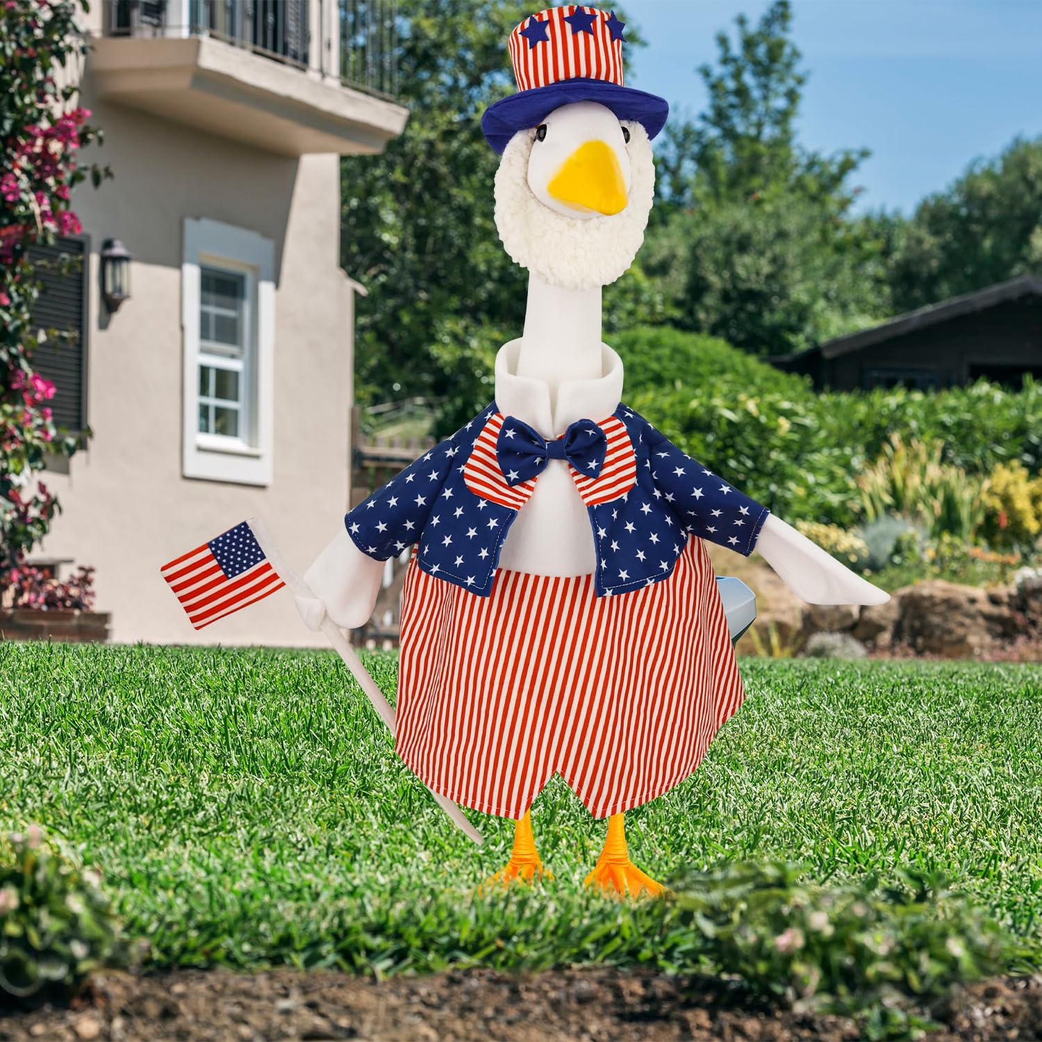Aymolas patriotic goose hat adds finishing touch to lawn display and holiday charm.