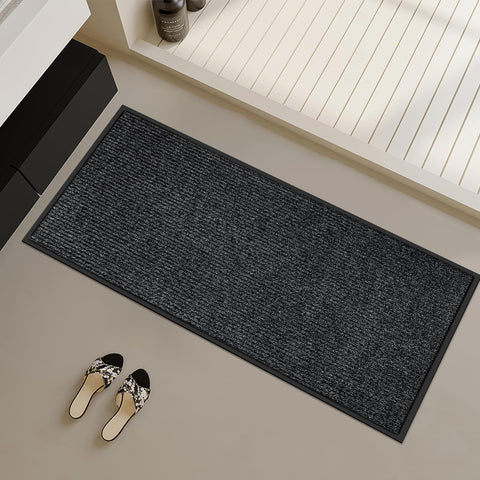 Azadx door mat with deep grooves that capture mud and moisture efficiently.