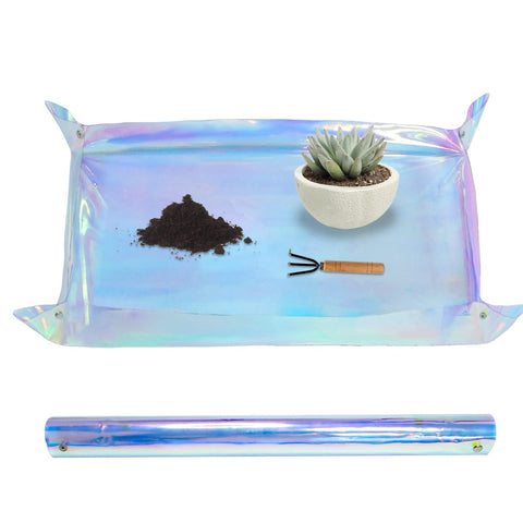 Azureblue iridescent repotting mat for indoor plants keeps the workspace tidy during potting.
