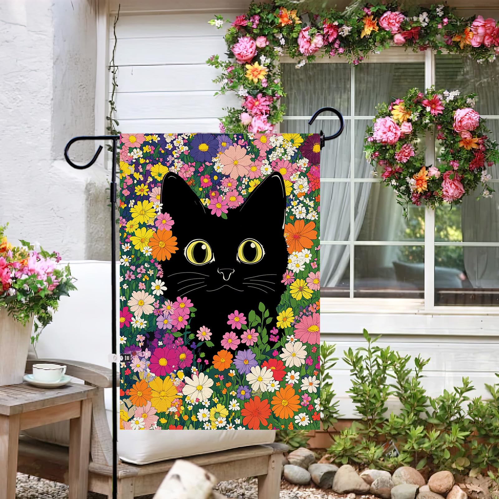 Baccessor black cat with flowers flag adds charming outdoor decor and hospitality.