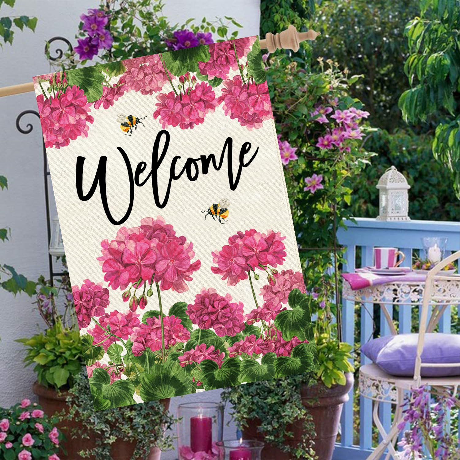 Baccessor geranium welcome flag complements farmhouse front yard decor