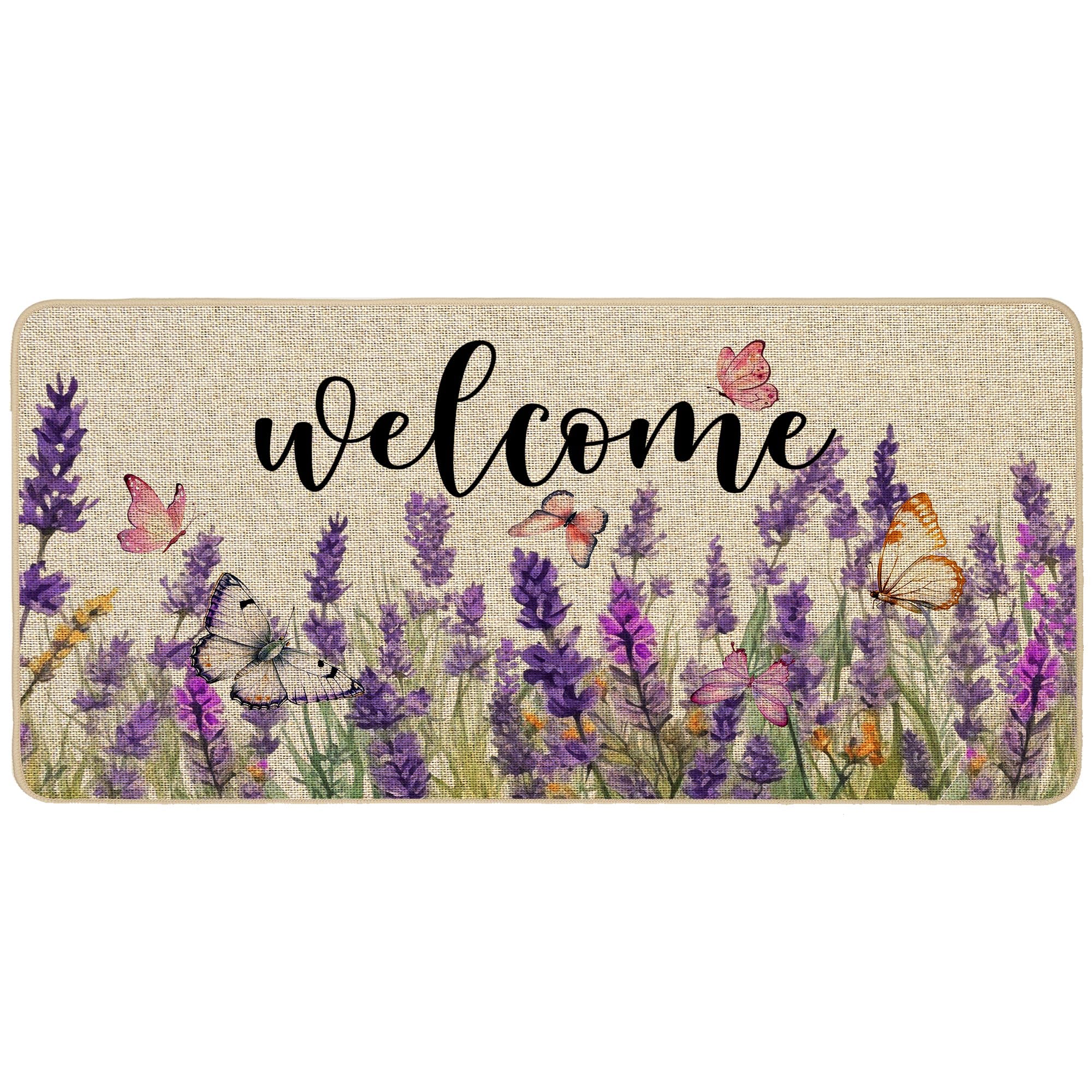 Baccessor lavender doormat featuring floral butterfly design welcomes guests and traps dirt.