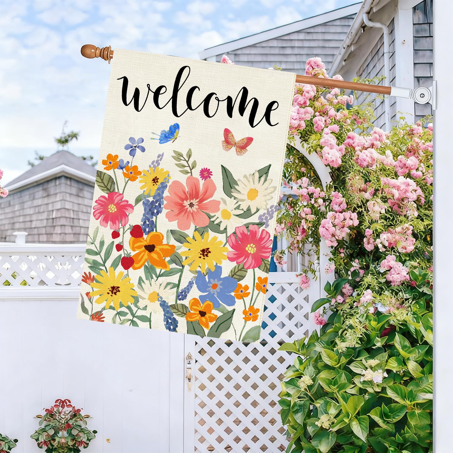 Baccessor porch flag hanging on a pole adds seasonal curb appeal.