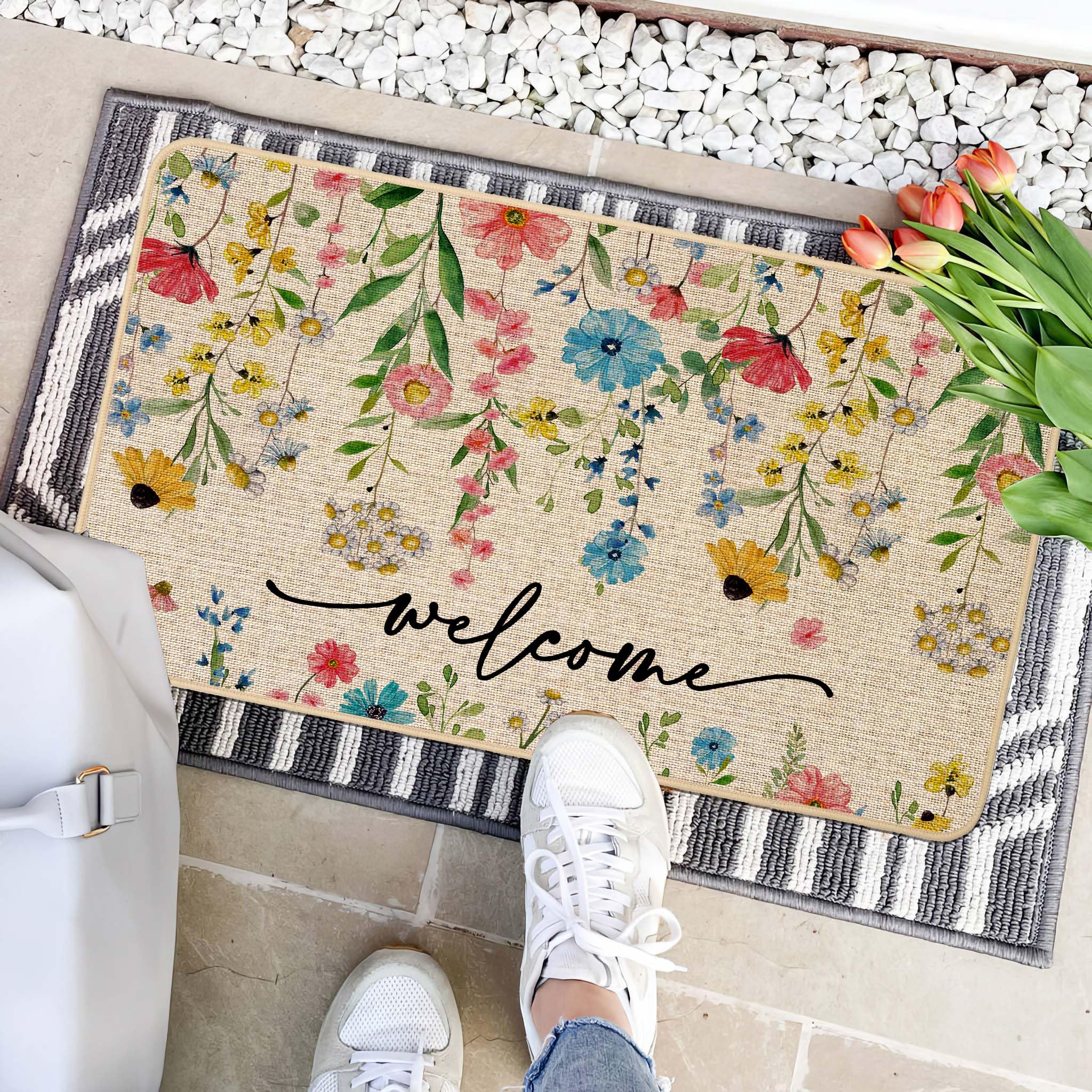 Baccessor Spring Floral Welcome Doormat outdoor patio scene demonstrates weather-ready durability.