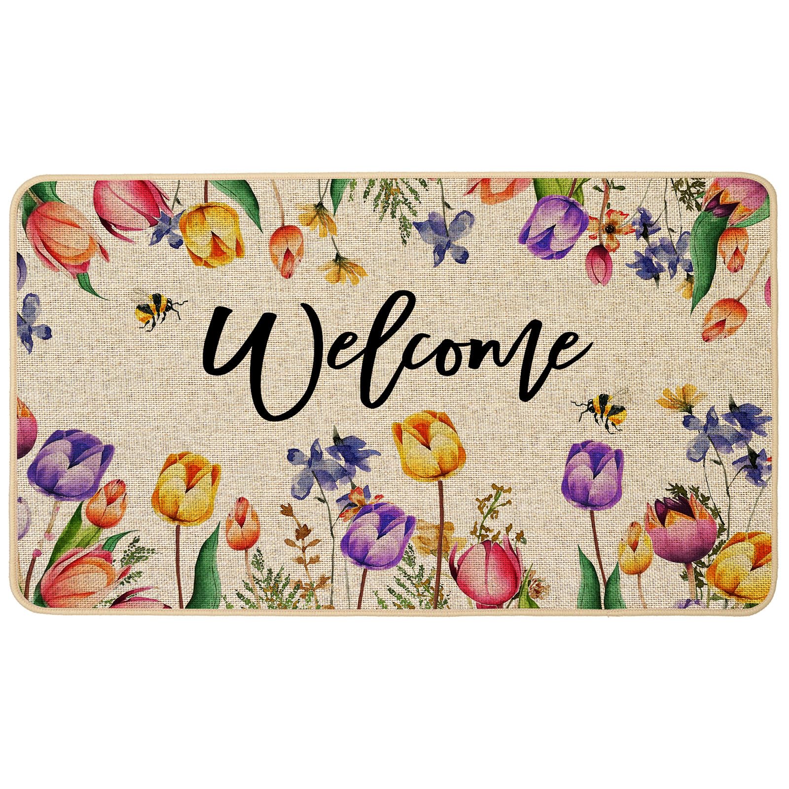 Baccessor Spring Tulips doormat at front door with purple pink flowers.