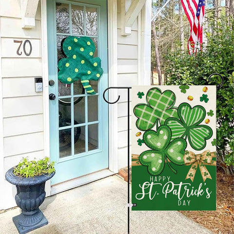 Outdoor welcome flag by Baccessor in a garden setting