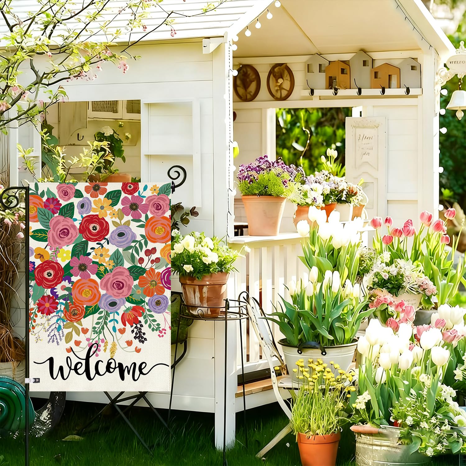 Baccessor tulip and daffodil print flag on porch adds seasonal charm.