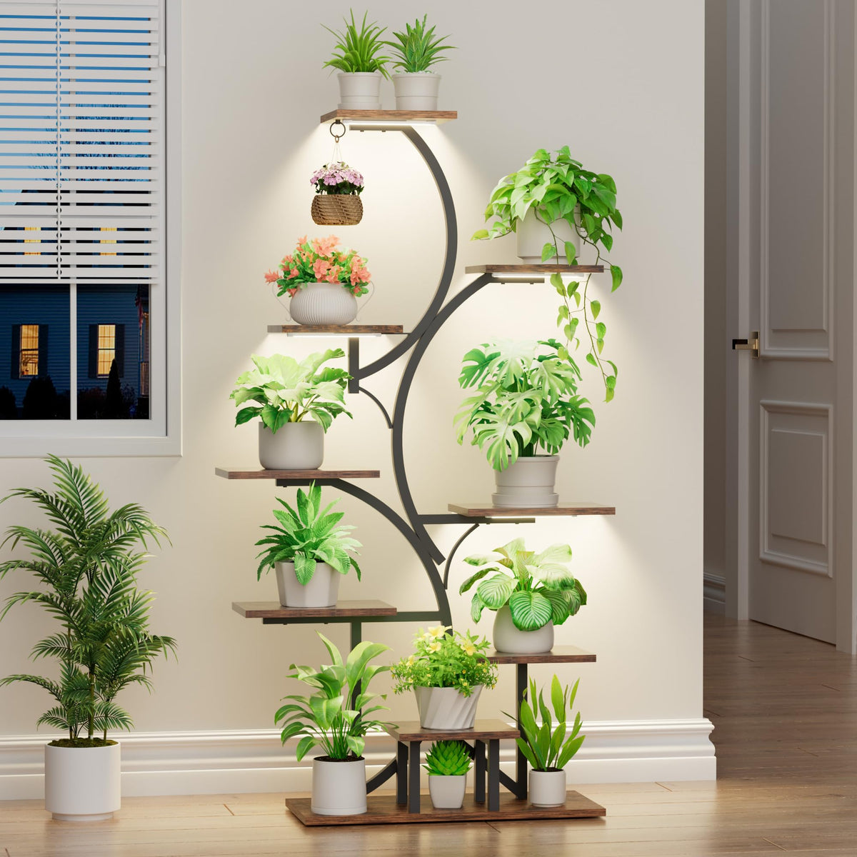BACEKOLL vine-shaped plant stand with integrated grow light for year-round indoor greenery.