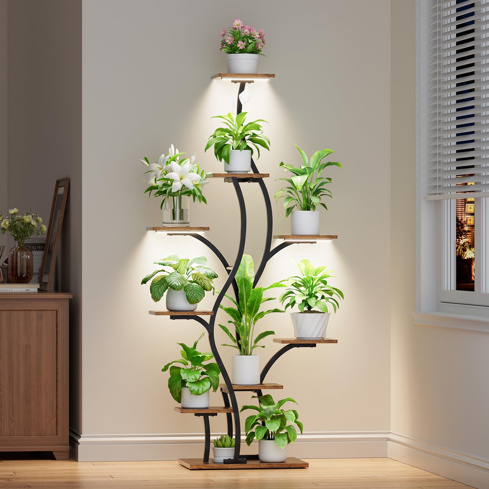 BACEKOLL plant stand with grow lights showcases tall plants in a bright living room.
