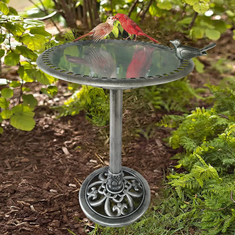 Backyard Expressions birdbath includes ground stakes for stable lawn placement.