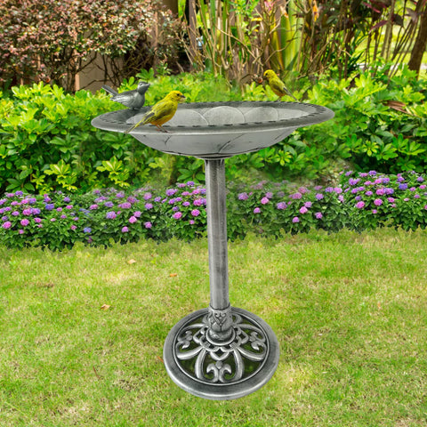 Backyard Expressions birdbath made of weather-resistant polyresin resists sun and rain.