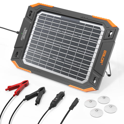 Baldr 13W solar panel trickle charger powering a 12V battery outdoors.