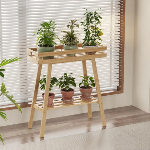 BAMBANG plant stand helps organize plants and decor in any room.